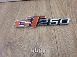 Genuine Suzuki GT250 Emblem Badge NOS Never Fitted! Free Delivery