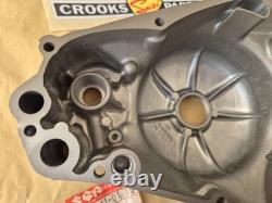 NOS 11341-01A10 TS125X 1986 to 1988 Genuine Suzuki Black Clutch Cover with marks