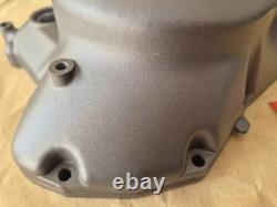 NOS 11341-01A10 TS125X 1986 to 1988 Genuine Suzuki Black Clutch Cover with marks