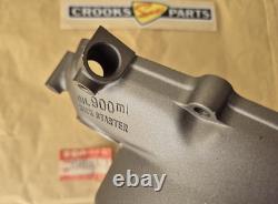 NOS 11341-01A10 TS125X 1986 to 1988 Genuine Suzuki Black Clutch Cover with marks