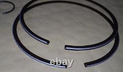 NOS 12110-41202 & 12140-41211 RM370 B 1977 Genuine Suzuki Std. Piston & Ring Set NOS 12110-41202 & 12140-41211 RM370 B 1977 Genuine Suzuki Std. Piston & Ring Set