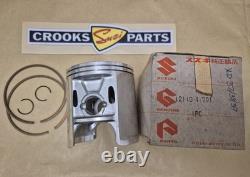 NOS 12110-41791 & 12140-41791 RM370 +. 75mm Genuine Suzuki Piston & Ring Set