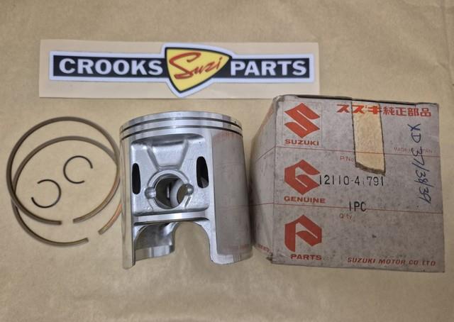 Nos 12110-41791 & 12140-41791 Rm370 +. 75mm Genuine Suzuki Piston & Ring Set