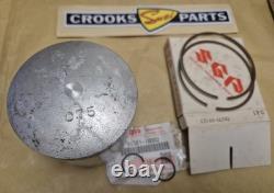 NOS 12110-41791 & 12140-41791 RM370 +. 75mm Genuine Suzuki Piston & Ring Set