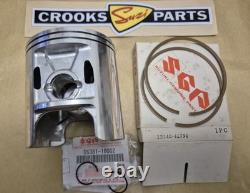 NOS 12110-41791 & 12140-41791 RM370 +. 75mm Genuine Suzuki Piston & Ring Set