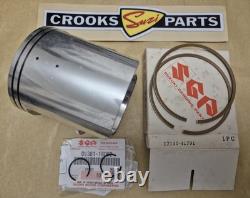 NOS 12110-41791 & 12140-41791 RM370 +. 75mm Genuine Suzuki Piston & Ring Set