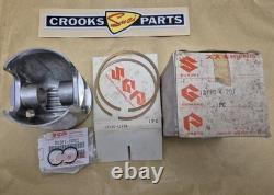 NOS 12110-41791 & 12140-41791 RM370 +. 75mm Genuine Suzuki Piston & Ring Set