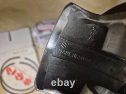 NOS 12110-41791 & 12140-41791 RM370 +. 75mm Genuine Suzuki Piston & Ring Set