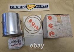 NOS 12110-41791 & 12140-41791 RM370 +. 75mm Genuine Suzuki Piston & Ring Set