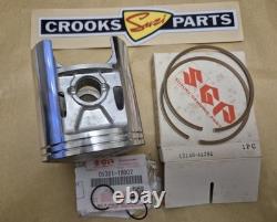NOS 12110-41791 & 12140-41791 RM370 +. 75mm Genuine Suzuki Piston & Ring Set
