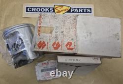 NOS 12110-41791 & 12140-41791 RM370 +. 75mm Genuine Suzuki Piston & Ring Set