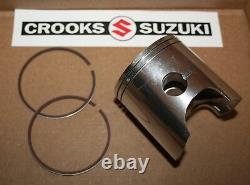 NOS Suzuki RM250 +. 25mm Suzuki Piston & Ring Set, 12110-41702 & 12140-40701