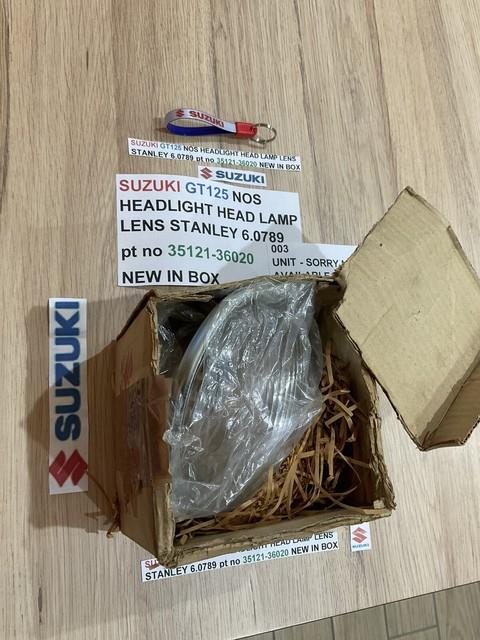 Suzuki Gt125 Nos Headlight Head Lamp Lens Stanley 6.0789 Pt No 35121-36020 New