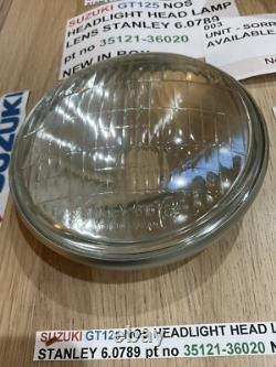 SUZUKI GT125 NOS HEADLIGHT HEAD LAMP LENS STANLEY 6.0789 pt no 35121-36020 NEW