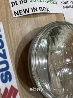 SUZUKI GT125 NOS HEADLIGHT HEAD LAMP LENS STANLEY 6.0789 pt no 35121-36020 NEW