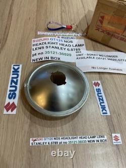 SUZUKI GT125 NOS HEADLIGHT HEAD LAMP LENS STANLEY 6.0789 pt no 35121-36020 NEW