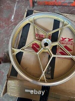 Suzuki 50 x1 front wheel NOS RARE