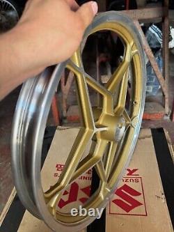 Suzuki 50 x1 front wheel NOS RARE