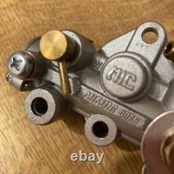 Suzuki GP 100/125 oil pump assembly 16100-39300 NOS