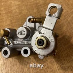 Suzuki GP 100/125 oil pump assembly 16100-39300 NOS