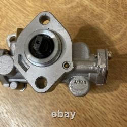 Suzuki GP 100/125 oil pump assembly 16100-39300 NOS