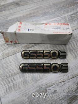 Suzuki GS550E PAIR SIDEPANEL BADGES NOS rare golds colour 68131-47300