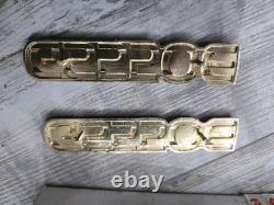 Suzuki GS550E PAIR SIDEPANEL BADGES NOS rare golds colour 68131-47300