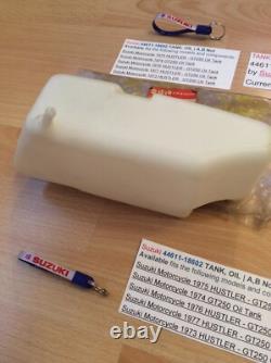 Suzuki GT250 T350 NOS OIL TANK WITH SUZUKI BAG + PARTS TAG PT NO 44611-18602