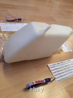 Suzuki GT250 T350 NOS OIL TANK WITH SUZUKI BAG + PARTS TAG PT NO 44611-18602