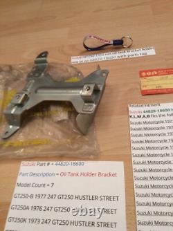 Suzuki GT250 T350 nos oil tank bracket holder new pt no 44820-18600 withparts tag
