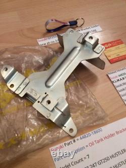 Suzuki GT250 T350 nos oil tank bracket holder new pt no 44820-18600 withparts tag