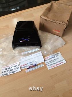 Suzuki GT250 X7 NOS all models Seat Tail unit in Black Gloss pt 45510-11300-019