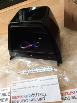 Suzuki GT250 X7 NOS all models Seat Tail unit in Black Gloss pt 45510-11300-019 Suzuki GT250 X7 NOS all models Seat Tail unit in Black Gloss pt 45510-11300-019