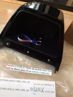 Suzuki GT250 X7 NOS all models Seat Tail unit in Black Gloss pt 45510-11300-019 Suzuki GT250 X7 NOS all models Seat Tail unit in Black Gloss pt 45510-11300-019