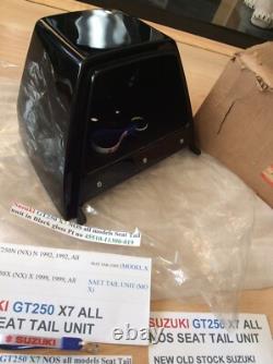 Suzuki GT250 X7 NOS all models Seat Tail unit in Black Gloss pt 45510-11300-019 Suzuki GT250 X7 NOS all models Seat Tail unit in Black Gloss pt 45510-11300-019