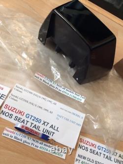Suzuki GT250 X7 NOS all models Seat Tail unit in Black Gloss pt 45510-11300-019 Suzuki GT250 X7 NOS all models Seat Tail unit in Black Gloss pt 45510-11300-019