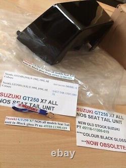Suzuki GT250 X7 NOS all models Seat Tail unit in Black Gloss pt 45510-11300-019