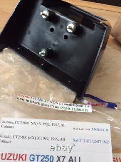 Suzuki GT250 X7 NOS all models Seat Tail unit in Black Gloss pt 45510-11300-019 Suzuki GT250 X7 NOS all models Seat Tail unit in Black Gloss pt 45510-11300-019