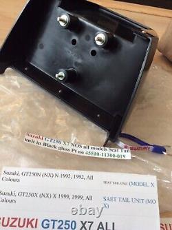 Suzuki GT250 X7 NOS all models Seat Tail unit in Black Gloss pt 45510-11300-019