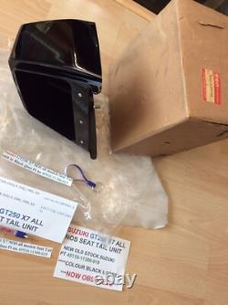 Suzuki GT250 X7 NOS all models Seat Tail unit in Black Gloss pt 45510-11300-019 Suzuki GT250 X7 NOS all models Seat Tail unit in Black Gloss pt 45510-11300-019