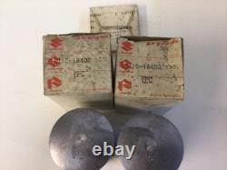 Suzuki Gt250 K, L 1973-1974 +50 Pistons + Rings Genuine Parts Nos 12110-18402-050