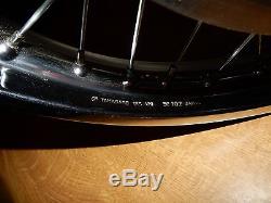 Suzuki Gt750 nos front wheel and discs