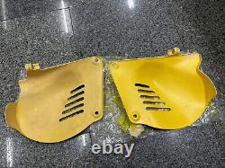 Suzuki PE175 RM100 RM125 L/R Frame Side Cover Yellow NOS 47111&47211-41301-019 Suzuki PE175 RM100 RM125 L/R Frame Side Cover Yellow NOS 47111&47211-41301-019