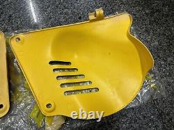 Suzuki PE175 RM100 RM125 L/R Frame Side Cover Yellow NOS 47111&47211-41301-019 Suzuki PE175 RM100 RM125 L/R Frame Side Cover Yellow NOS 47111&47211-41301-019