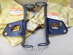 Suzuki TS125 TS125X Headlamp Stay L+R NOS Fork Ears BRACKET 51530 / 51540-01A00