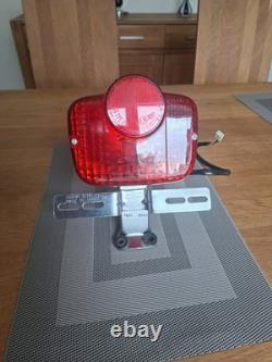 Vintage Suzuki T250 TS 50 100 125 185 250 400 Rear Lamp and Bracket. NOS OEM