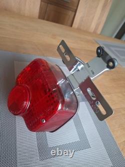 Vintage Suzuki T250 TS 50 100 125 185 250 400 Rear Lamp and Bracket. NOS OEM
