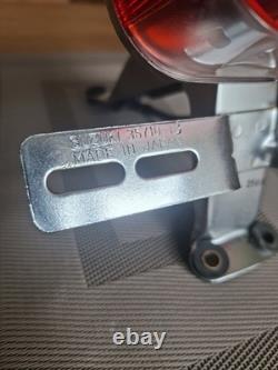 Vintage Suzuki T250 TS 50 100 125 185 250 400 Rear Lamp and Bracket. NOS OEM