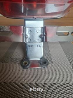 Vintage Suzuki T250 TS 50 100 125 185 250 400 Rear Lamp and Bracket. NOS OEM